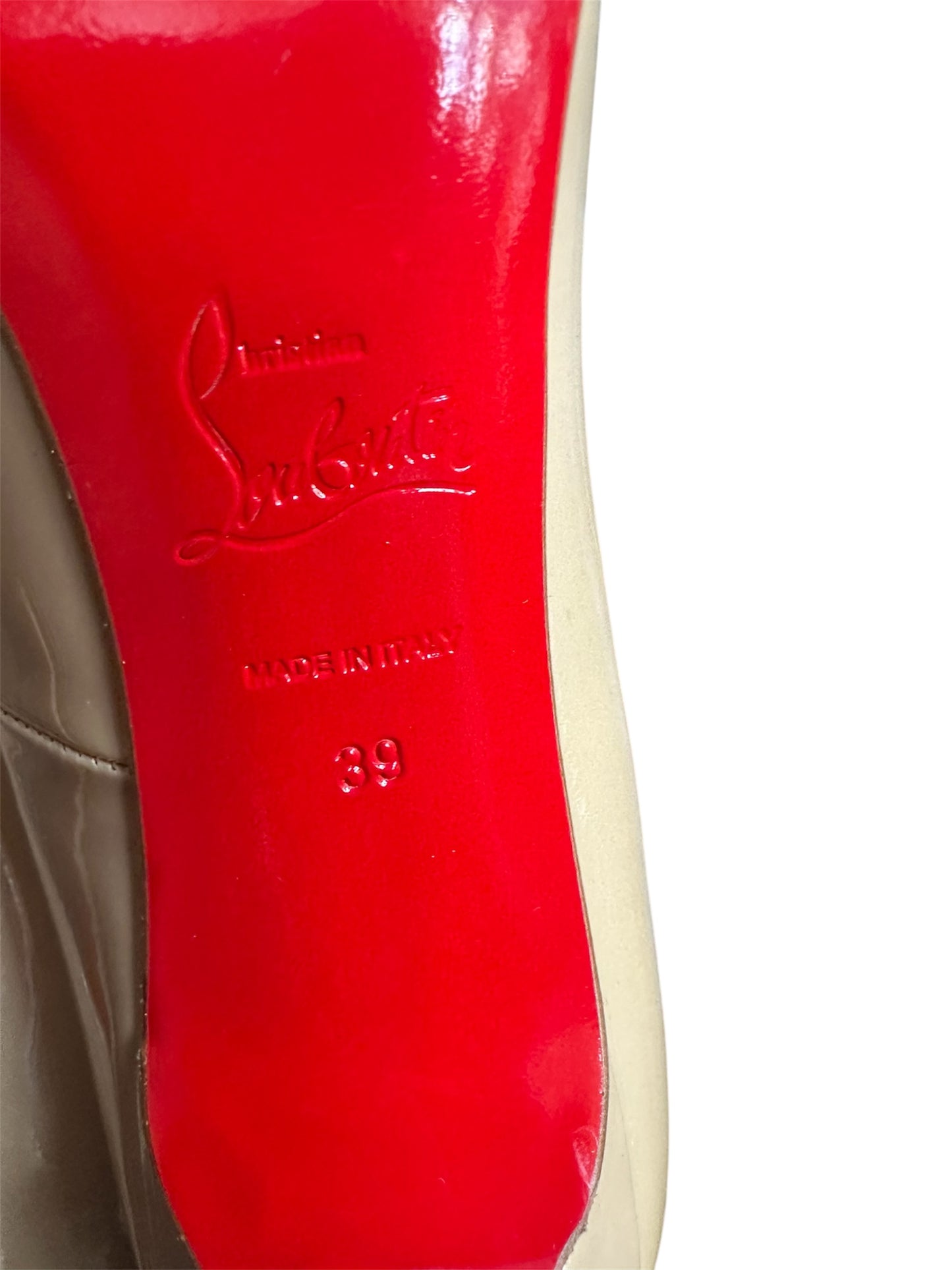 Authentic designer taupe pump with dust bag size 39