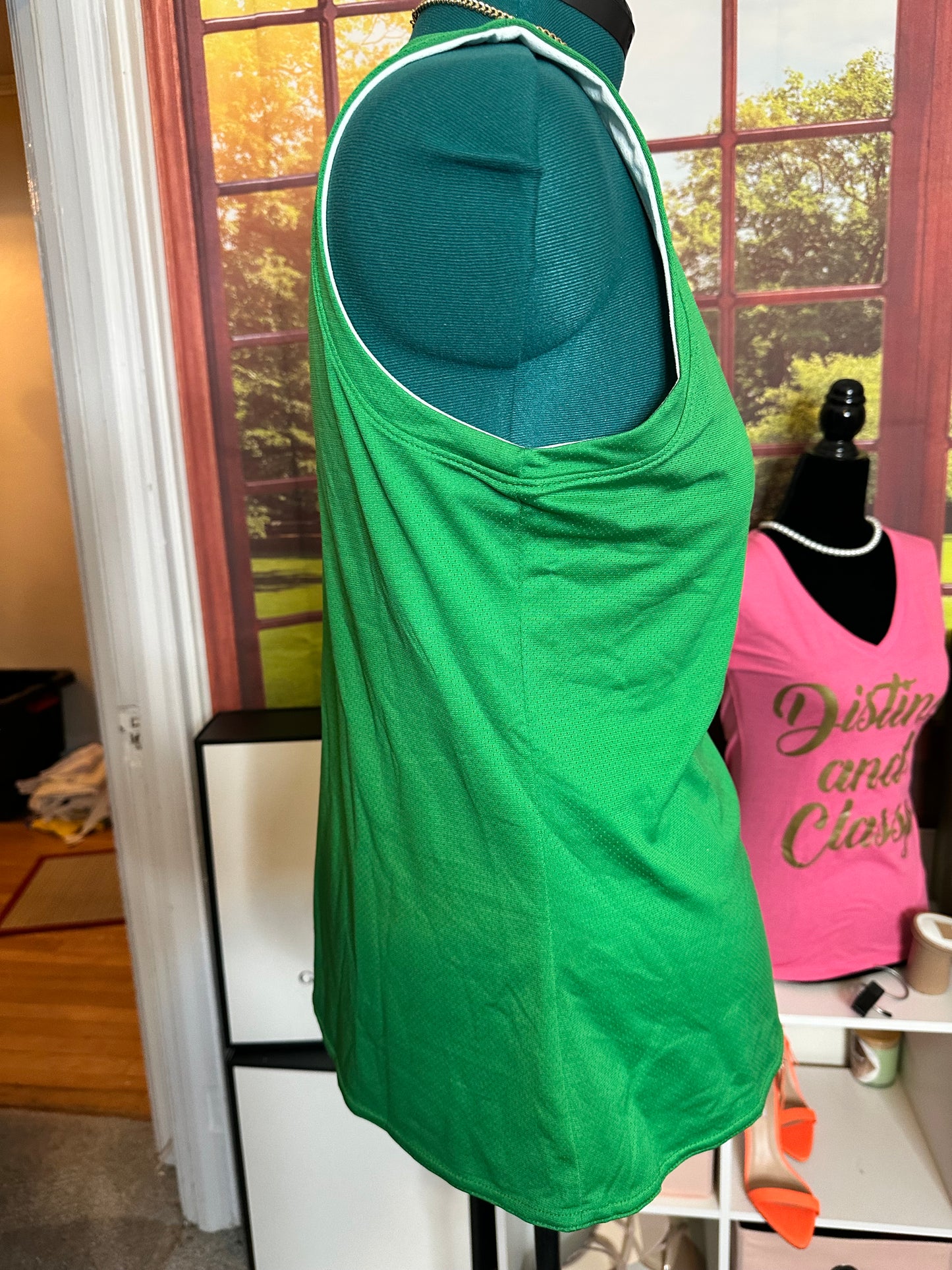 NWT Woman’s Nike Jordan Reversible Green and White Sleeveless Jersey Sz L